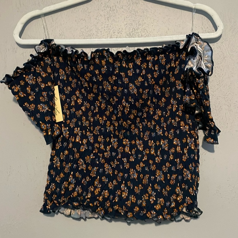Tube top with attached sleeves